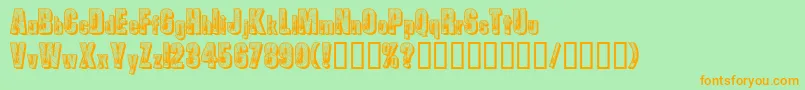 Spiders-Schriftart – Orangefarbene Schriften auf grünem Hintergrund