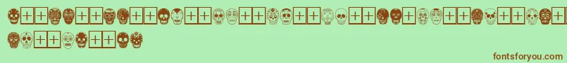 DiaDeLosMuertosLimitedFreeVersion-Schriftart – Braune Schriften auf grünem Hintergrund