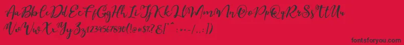 Esteh-Schriftart – Schwarze Schriften auf rotem Hintergrund