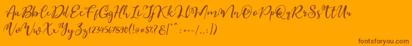 Esteh Font – Brown Fonts on Orange Background