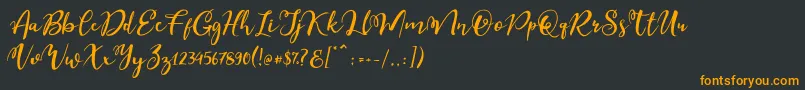 Шрифт Esteh – оранжевые шрифты на чёрном фоне