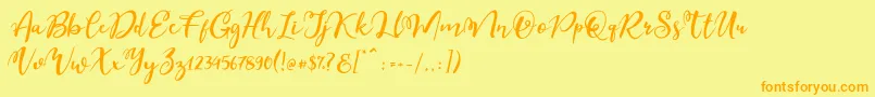 Esteh-Schriftart – Orangefarbene Schriften auf gelbem Hintergrund