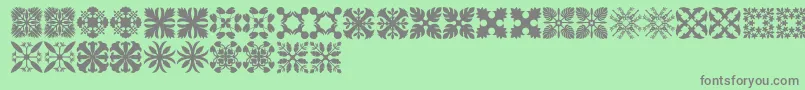 HawaiianQuilt3 Font – Gray Fonts on Green Background