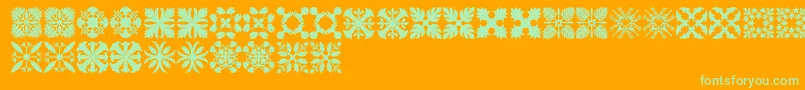 HawaiianQuilt3-Schriftart – Grüne Schriften auf orangefarbenem Hintergrund