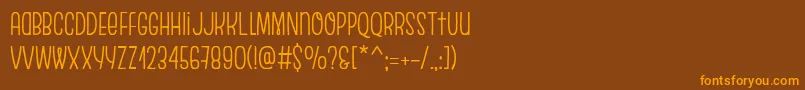 EscalopeCrustOne Font – Orange Fonts on Brown Background