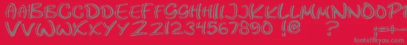 Paco Font – Gray Fonts on Red Background