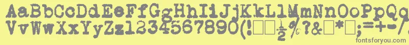 L.C.Smith5Typewriter Font – Gray Fonts on Yellow Background