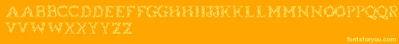 Tribalcase Font – Yellow Fonts on Orange Background