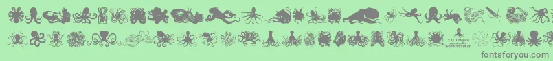 TheOctopus-Schriftart – Graue Schriften auf grünem Hintergrund