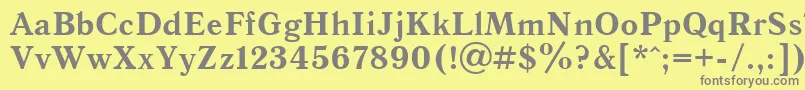 フォントQuantantiquacBold – 黄色の背景に灰色の文字