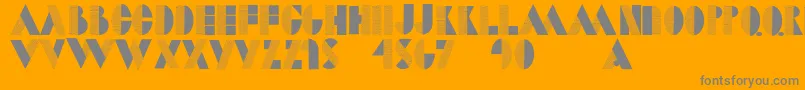 Saiba mais sobre a fonte Dotcapsmk Fonte Dotcapsmk – fontes cinzas em um fundo laranja