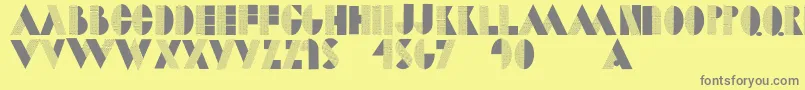 Weitere Informationen zur Dotcapsmk-Schriftart Dotcapsmk-Schriftart – Graue Schriften auf gelbem Hintergrund