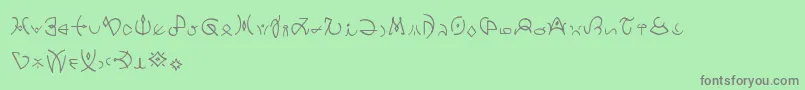 フォントClavatscript – 緑の背景に灰色の文字