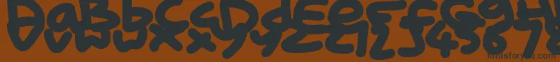 KidMarker Font – Black Fonts on Brown Background