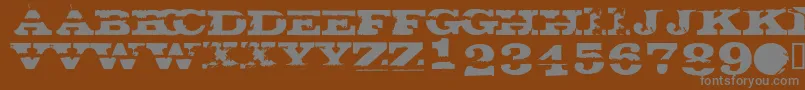 GatecrasherTexan Font – Gray Fonts on Brown Background