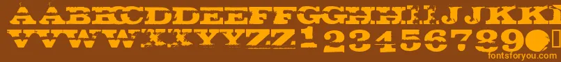 GatecrasherTexanフォントについての詳細 フォントGatecrasherTexan – オレンジ色の文字が茶色の背景にあります。
