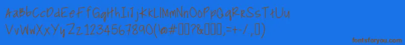 BullfrogsAndButterflies Font – Brown Fonts on Blue Background