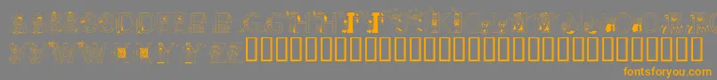 フォントLmsLearnToSpell – オレンジの文字は灰色の背景にあります。