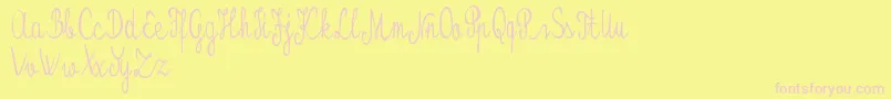 Kristalypersonaluse Font – Pink Fonts on Yellow Background