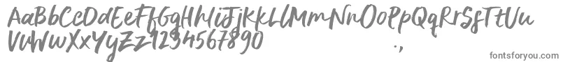 DeliriumSample-fontti – harmaat kirjasimet valkoisella taustalla