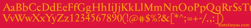 Czcionka Jannontextmed – pomarańczowe czcionki na czerwonym tle