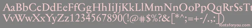 Jannontextmed-Schriftart – Rosa Schriften auf grauem Hintergrund