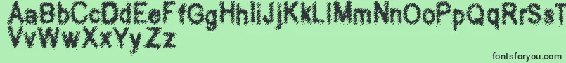 Hubbly-Schriftart – Schwarze Schriften auf grünem Hintergrund
