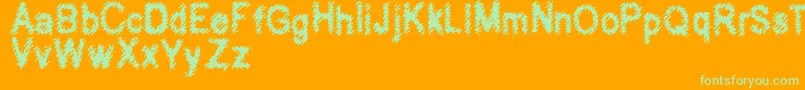 Hubbly-Schriftart – Grüne Schriften auf orangefarbenem Hintergrund