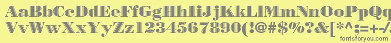 フォントBorjomidecorbc – 黄色の背景に灰色の文字