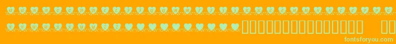 Czcionka KrAmishHeart – zielone czcionki na pomarańczowym tle