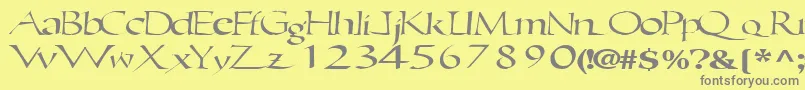 フォントEricbrush21RegularTtext – 黄色の背景に灰色の文字