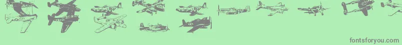 Ww2Aircraft-Schriftart – Graue Schriften auf grünem Hintergrund