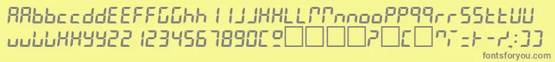 LeslieRegular-fontti – harmaat kirjasimet keltaisella taustalla