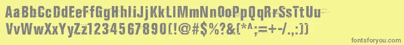 Fonte CompletelyNonsense – fontes cinzas em um fundo amarelo