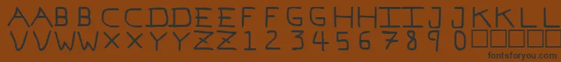 PfVeryverybadfont7 Font – Black Fonts on Brown Background