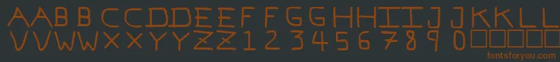 PfVeryverybadfont7-fontti – ruskeat fontit mustalla taustalla