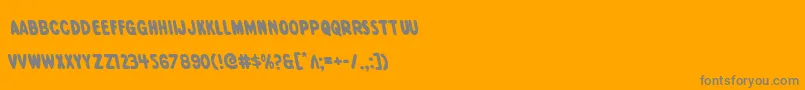 Excelsiorcomicsleft-Schriftart – Graue Schriften auf orangefarbenem Hintergrund