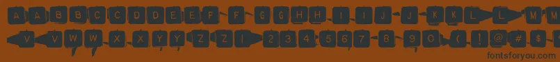 フォントBackspacersquare – 黒い文字が茶色の背景にあります