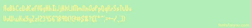 フォントBocumaad – 黄色の文字が緑の背景にあります
