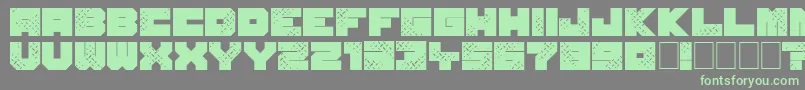 フォントSevenOfOne – 灰色の背景に緑のフォント
