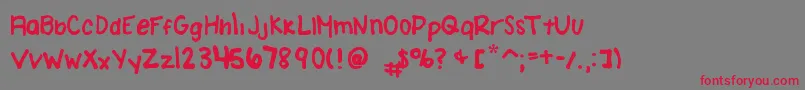 フォントAmandaBrodzinskiFont – 赤い文字の灰色の背景