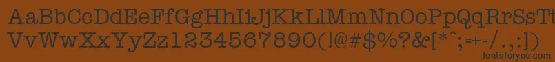 Typewr-fontti – mustat fontit ruskealla taustalla