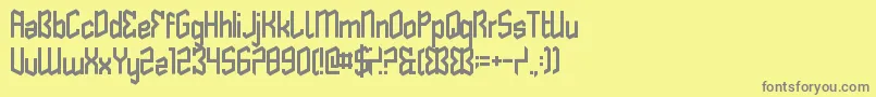 ButterflyReflect-fontti – harmaat kirjasimet keltaisella taustalla