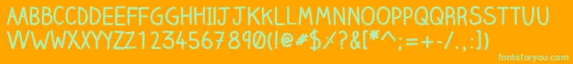 Clairehandbold-Schriftart – Grüne Schriften auf orangefarbenem Hintergrund