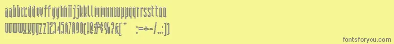 Andiron-Schriftart – Graue Schriften auf gelbem Hintergrund