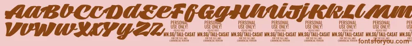 フォントTallcasatfatPersonalUse – ピンクの背景に茶色のフォント