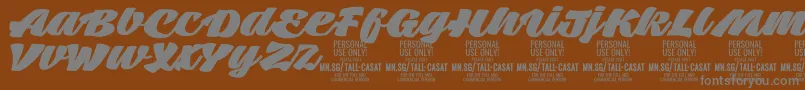 TallcasatfatPersonalUse Font – Gray Fonts on Brown Background