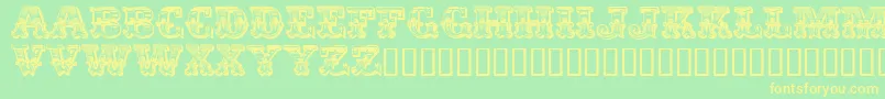 EgyptienneZierversalien Font – Yellow Fonts on Green Background