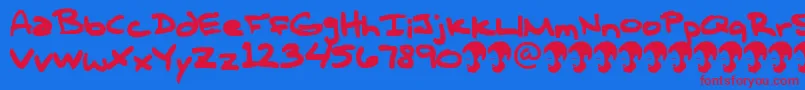 OpnTComplanaZ Font – Red Fonts on Blue Background