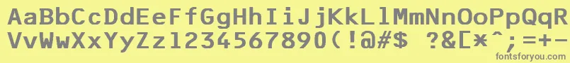 フォントF25BankPrinter – 黄色の背景に灰色の文字